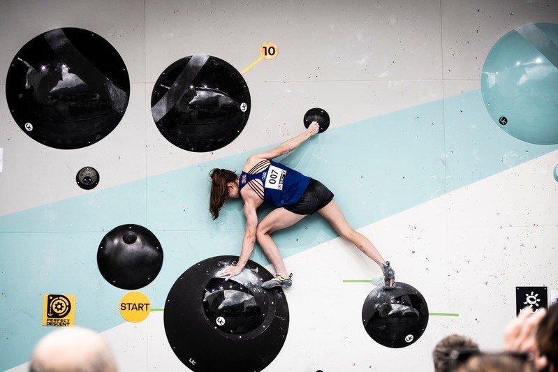 A climber on Unleashed Terrors macros at World Climbing Innsbruck 2026